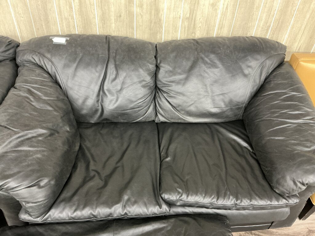 #1 black Italian leather 90's love seat